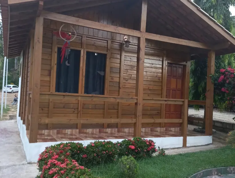 Como a manutenção preserva a beleza da casa de madeira
